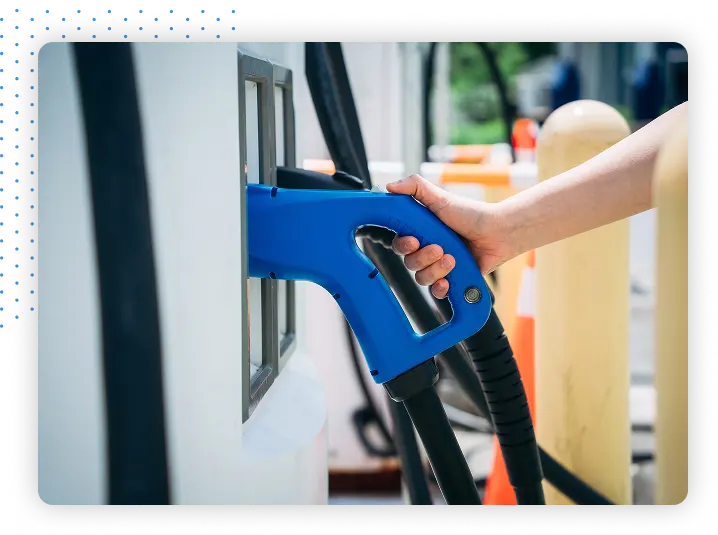 Hand holding fuel pump